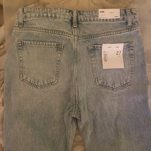 Boutique jeans. Brand new with tags. Never worn. Distressed, light wash